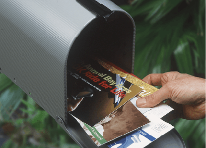 mailbox with flyers, brochures, postcards